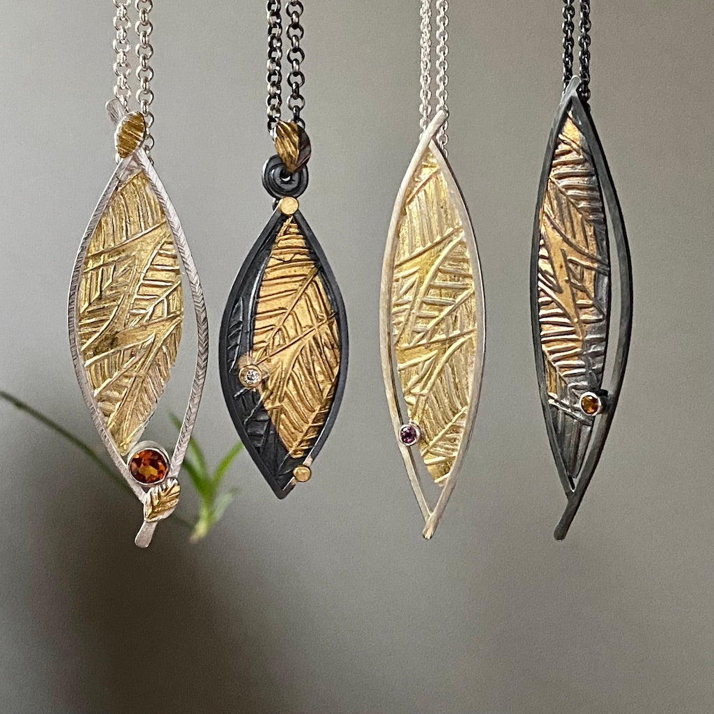 Limited-edition Flow series of pendants. Oone-of-a-kind. Leaf texture. Keum-Boo. Argentium silver, 24-karat gold, gemstones.