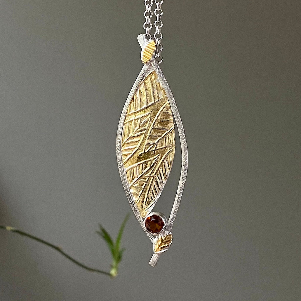 Flow pendant. Argentium silver, 24-karat gold, citrine on an 18-inch oxidized silver chain.