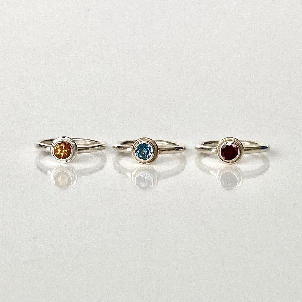 Essential Rings, silver with citrine, sky blue topaz, rhodolite garnet